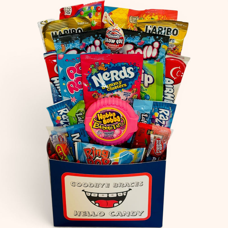CandyCakeExplosion Braces Off Bouquet featuring a variety of gummy, chewy, and fruity candies in a celebratory box.