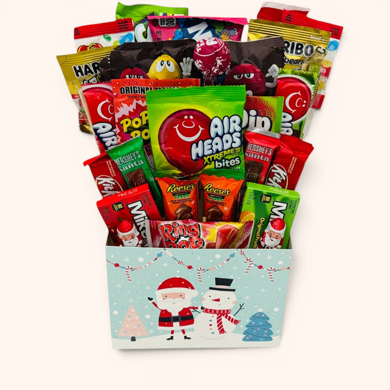 CandyCakeExplosion Christmas Box Bouquet featuring assorted holiday candies in a festive winter-themed gift box.
