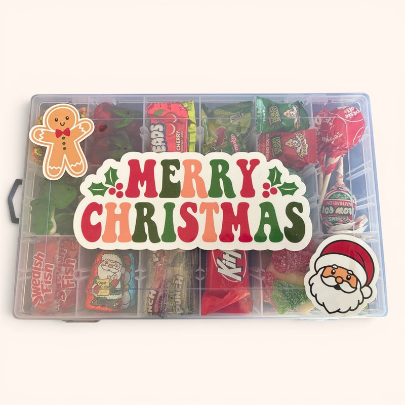 CandyCakeExplosion Christmas XL candy tackle box filled with assorted holiday sweets, featuring festive stickers.
