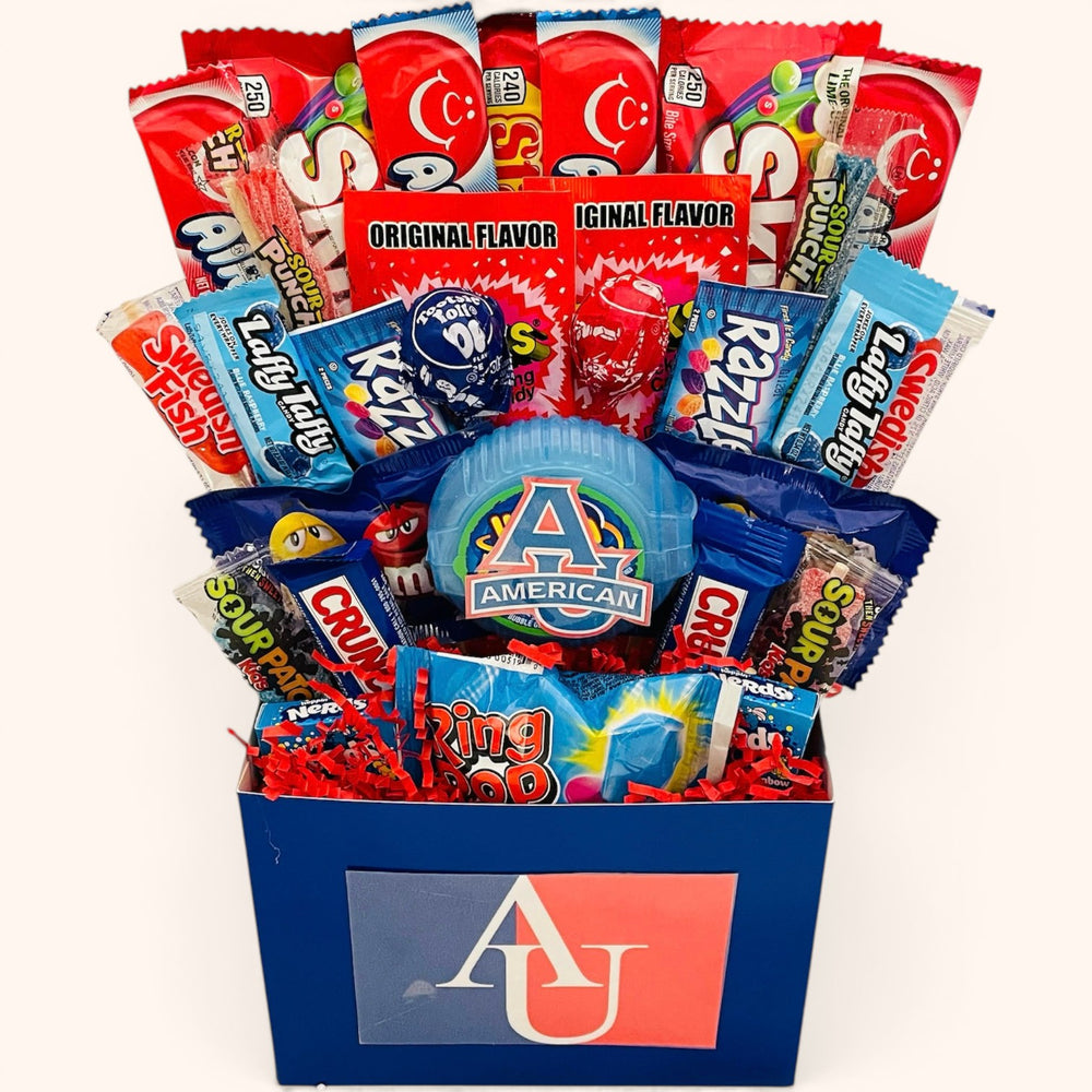 CandyCakeExplosion College Candy Bouquet featuring assorted chocolate bars and sweets in a blue branded gift box