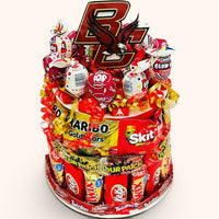 CandyCakeExplosion small college candy cake featuring red and gold chocolates, candy bars, and a Boston College topper.