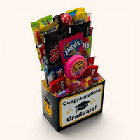 CandyCakeExplosion Congratulations Graduate candy bouquet featuring 25 assorted non-chocolate treats in a gift box.