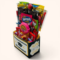 CandyCakeExplosion graduation candy bouquet in a decorative box with assorted full-size and fun-size treats.