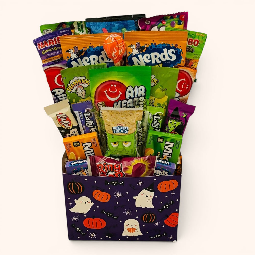 CandyCakeExplosion Halloween box bouquet filled with assorted candies, snacks, and a festive ghost-themed gift box.
