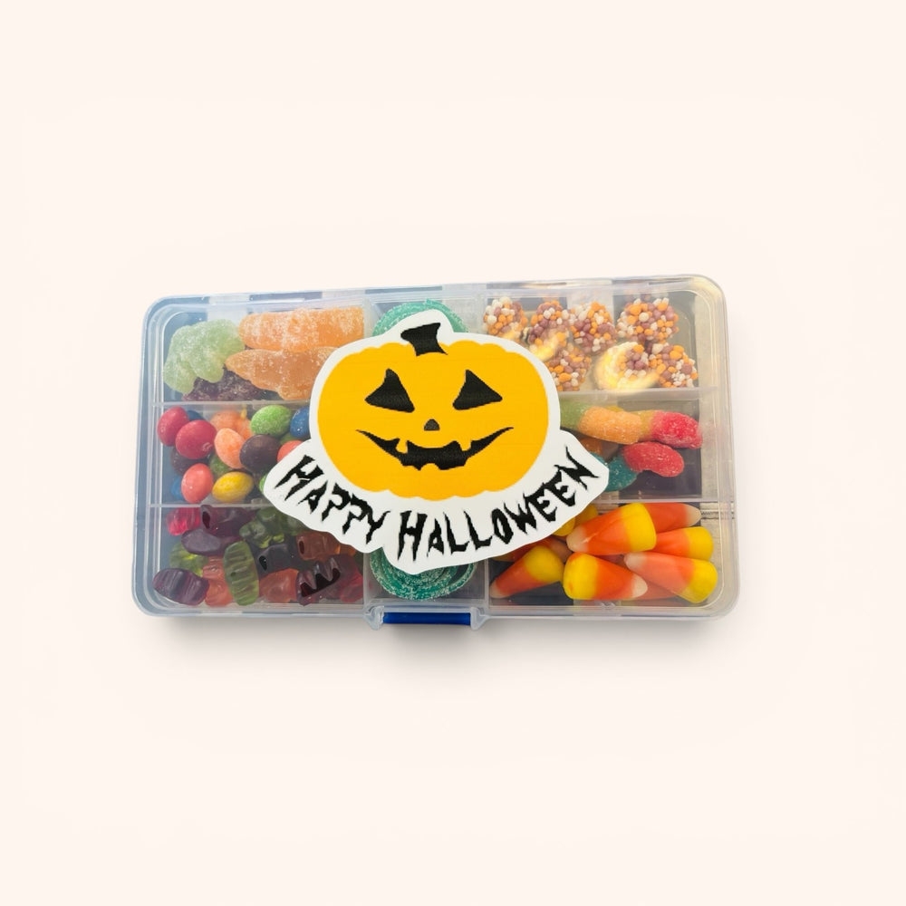 CandyCakeExplosion Halloween mini-tackle box filled with assorted colorful festive gummies and candy corn