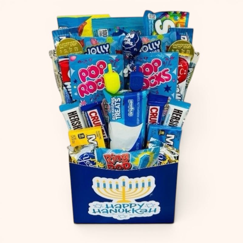 CandyCakeExplosion Hanukkah gift box filled with blue, silver, and white themed candies and treats for the holidays.