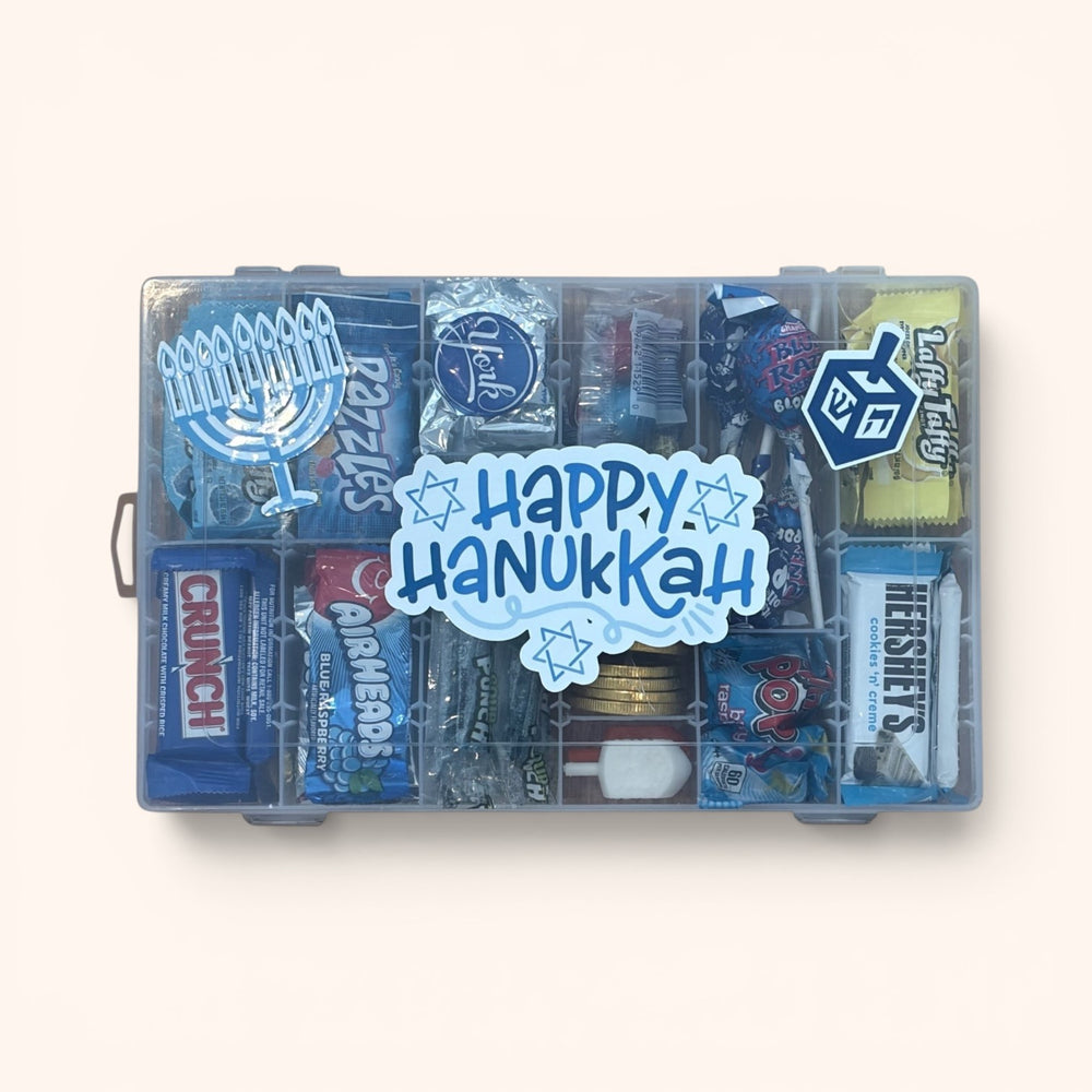 CandyCakeExplosion Hanukkah XL candy tackle box filled with blue, silver, and white sweets and holiday decorations.