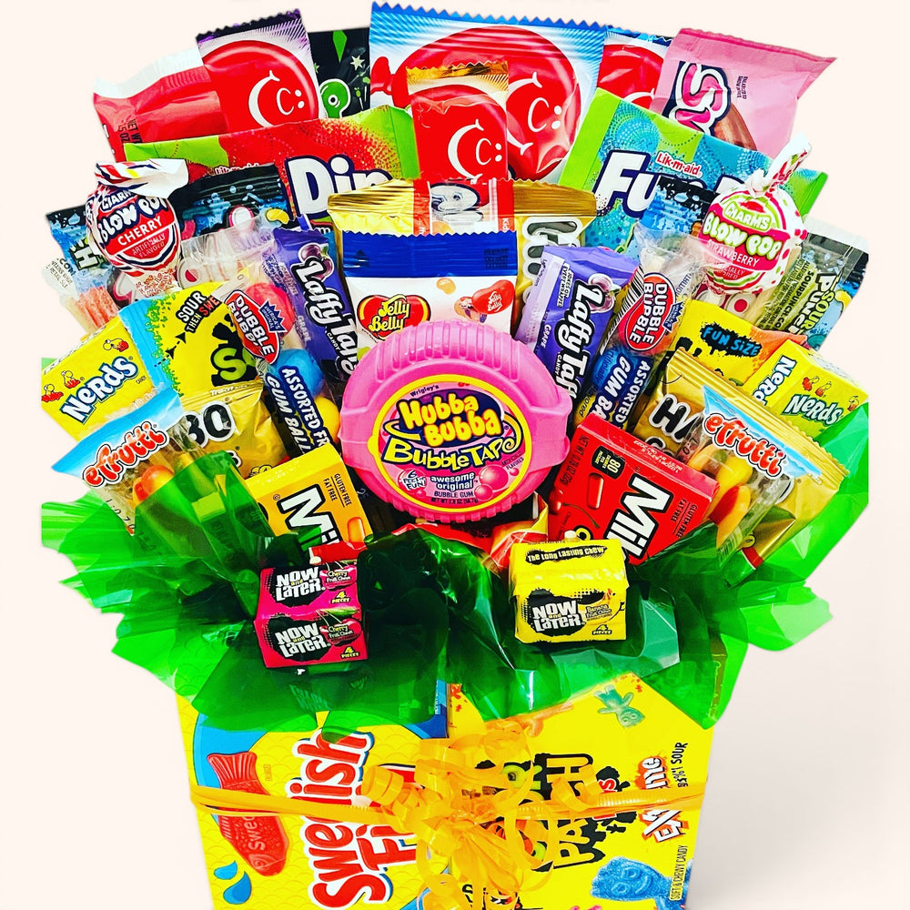 CandyCakeExplosion large non-chocolate sweets bouquet featuring colorful gummies, sour chews, and Hubba Bubba gum.