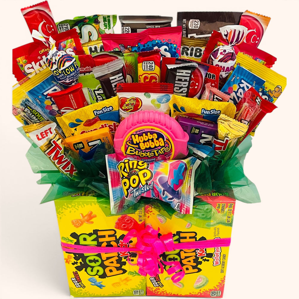 CandyCakeExplosion large sweets bouquet featuring assorted chocolate bars, candy, and Hubba Bubba in a gift box.