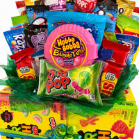 CandyCakeExplosion large sweets bouquet featuring assorted chocolate bars, Hubba Bubba gum, and Ring Pop candy.