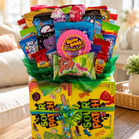 CandyCakeExplosion large sweets bouquet featuring assorted candy bars, Hubba Bubba, and Sour Patch Kids gift box.