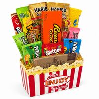 CandyCakeExplosion Movie Night Bouquet featuring assorted chocolates, candy bars, and popcorn in a theater-style box.