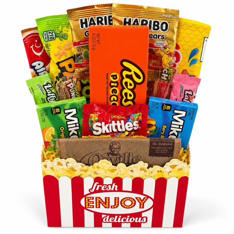 CandyCakeExplosion Movie Night Bouquet featuring assorted chocolates, candy bars, and popcorn in a theater-style box.