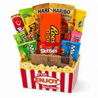 CandyCakeExplosion Movie Night Bouquet featuring assorted chocolates, candy bars, and popcorn in a theater-style box.