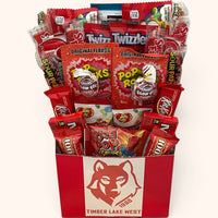 CandyCakeExplosion Camp Box Bouquet featuring assorted non-chocolate chewy, sour, and fruity candies in a red box.