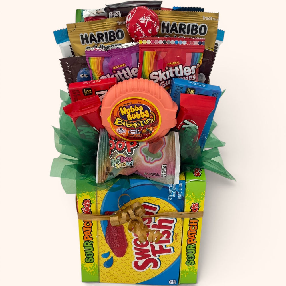 CandyCakeExplosion small candy bouquet featuring assorted chocolates, Skittles, Haribo, and Hubba Bubba in a gift box.
