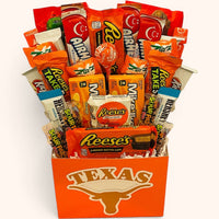 CandyCakeExplosion College Candy Bouquet featuring assorted chocolate bars and orange-themed treats in a Texas box.